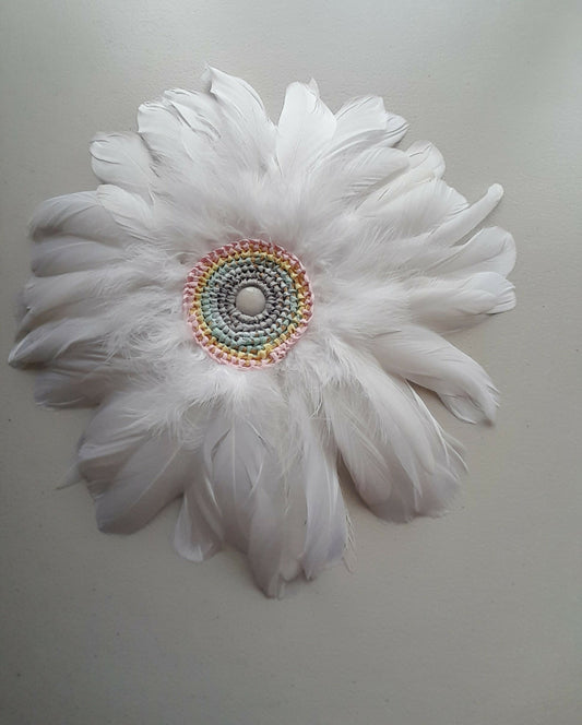 White feather wall hanging