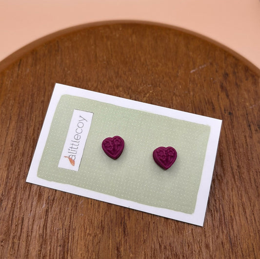 Stud earrings by alittlecoy