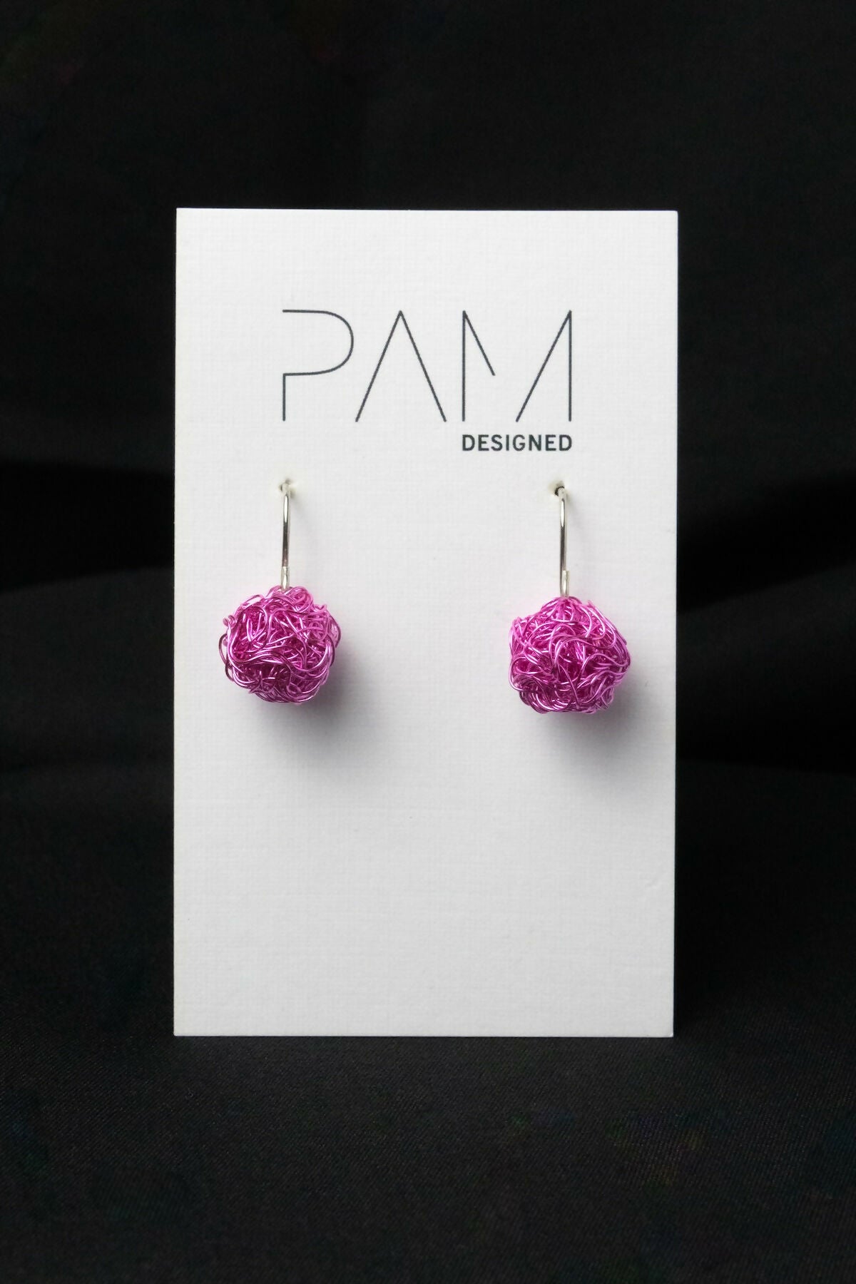 Pom pom and small wire earrings