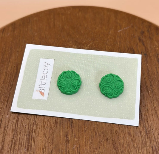 Stud earrings by alittlecoy