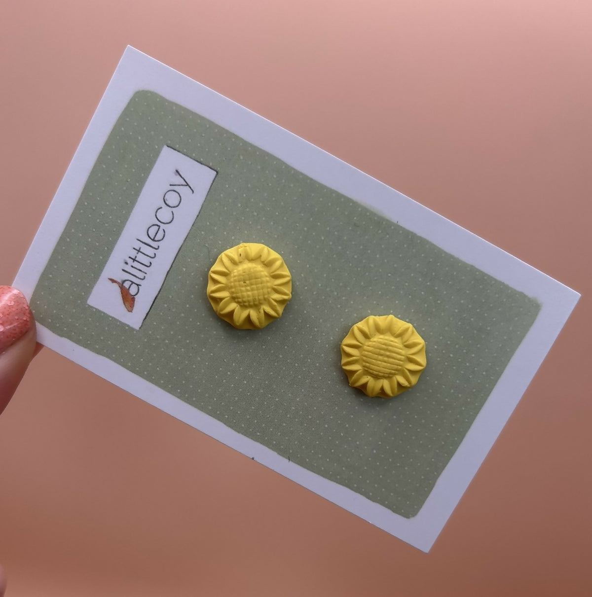 Stud earrings by alittlecoy